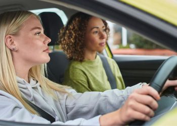 The Disruptive Impact of Electric Vehicles on Traditional Automakers’ Production Models