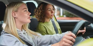 The Disruptive Impact of Electric Vehicles on Traditional Automakers’ Production Models